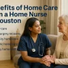A skilled ICON Home Health nurse in navy scrubs provides compassionate in-home care to an elderly woman in a Houston-area residence.