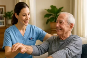 Icon Home Health nurse assisting senior male patient with a gentle arm stretch in a bright, cozy living room for pain management care.