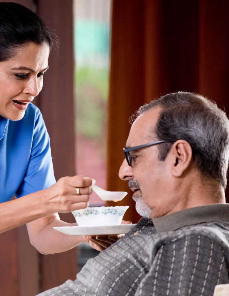 woman feeding a man