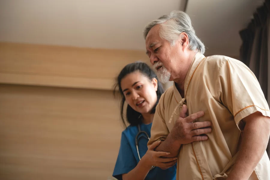 man being assisted in a nursing home