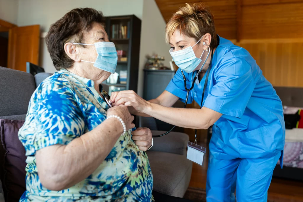 woman being assisted in a nursing home