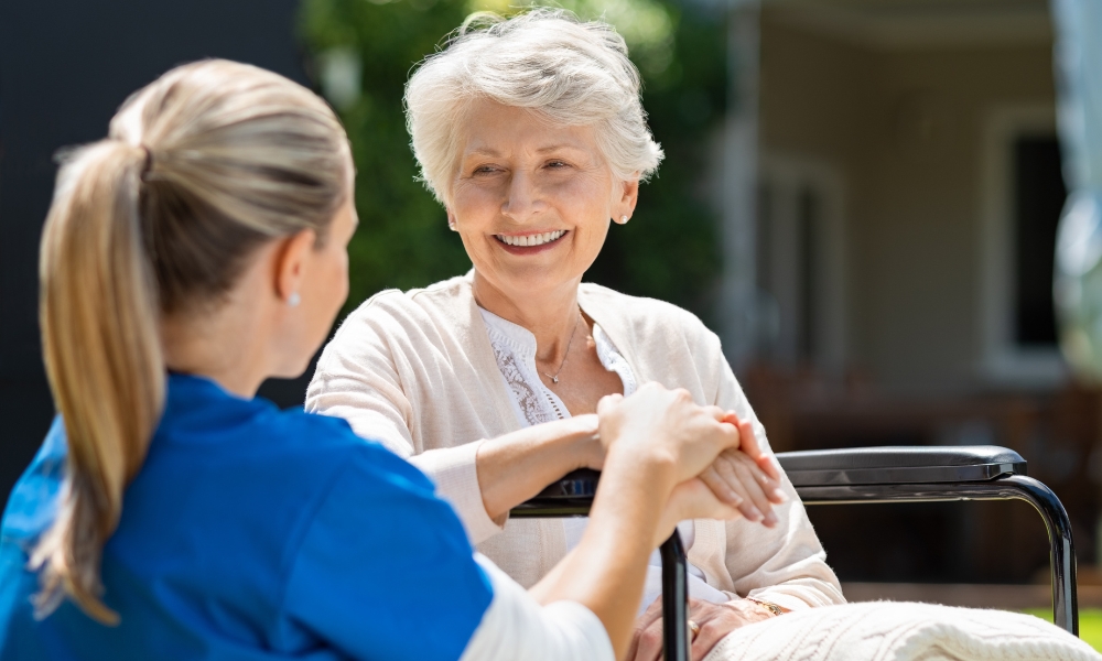 Skilled home health nurse helping patient recover after hospital discharge